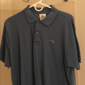 Lacoste blue polo in blue in size large